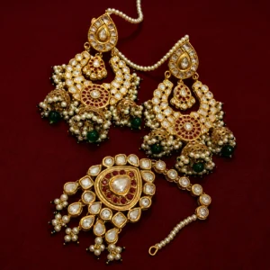 24k Gold Kundan earring and maang tikka set with ruby stones and emerald pearls.