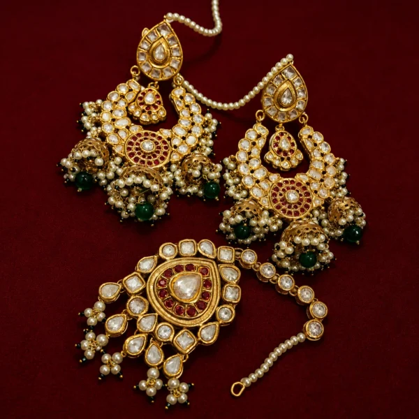 24k Gold Kundan earring and maang tikka set with ruby stones and emerald pearls.
